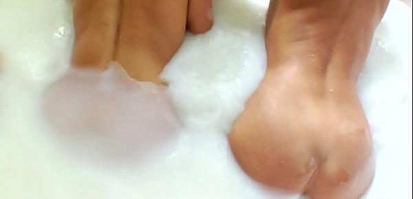  Enema babes take a milky bath together